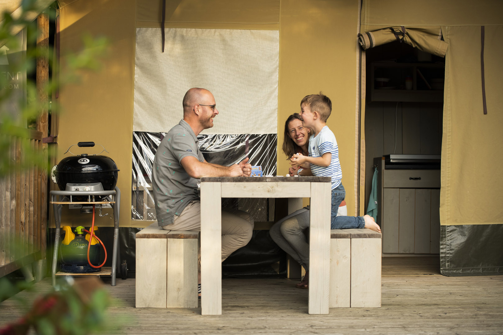 Luxury glamping tent in a family campground