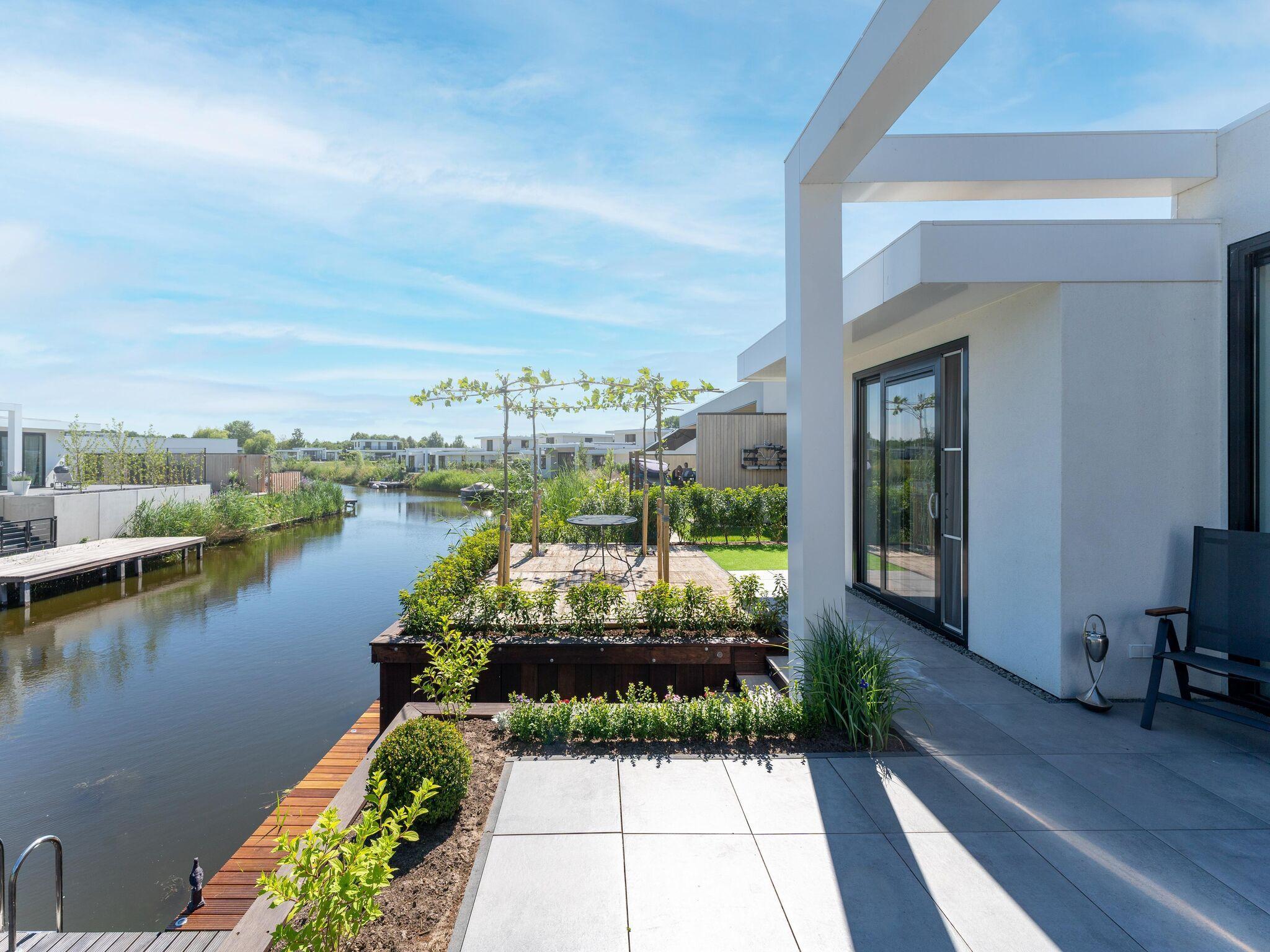 Attractive villa with jacuzzi on the waterfront