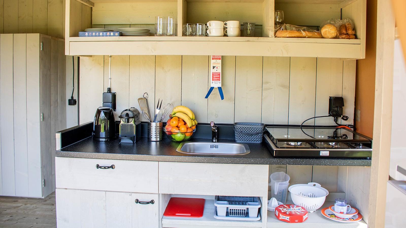 Luxury glamping tent in a family campground