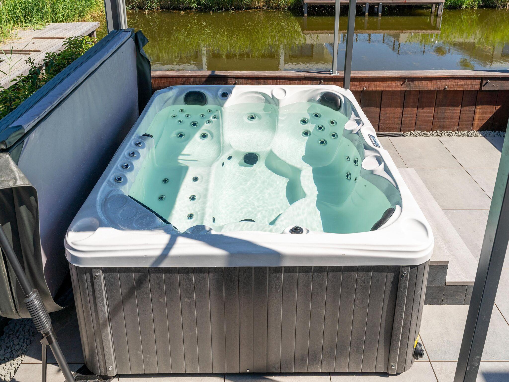 Attractive villa with jacuzzi on the waterfront