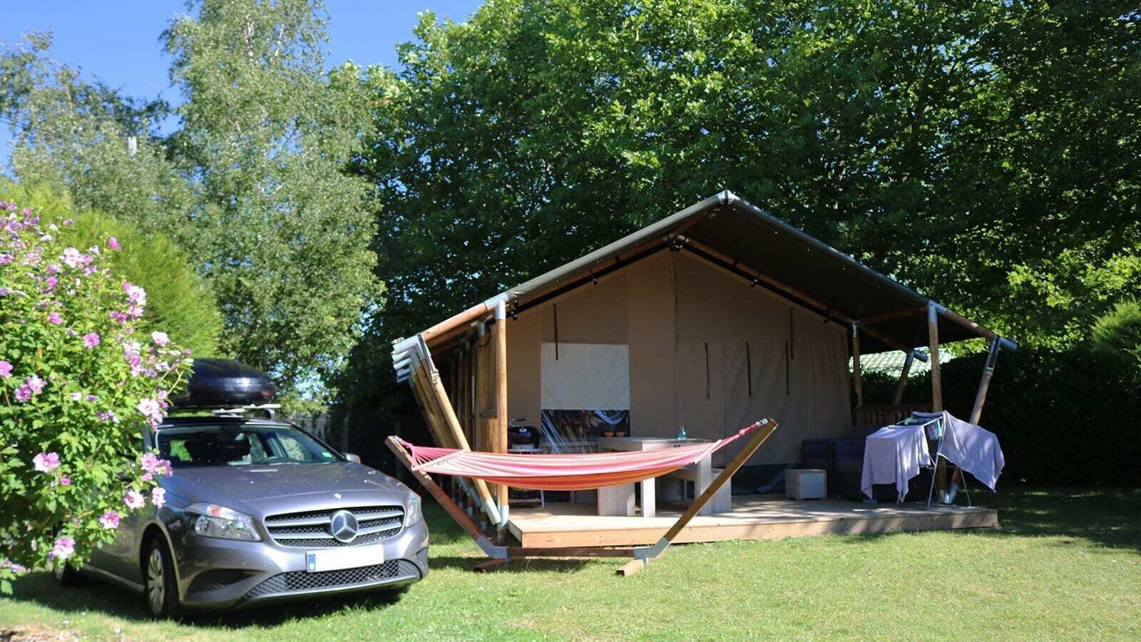 Luxury glamping tent in a family campground