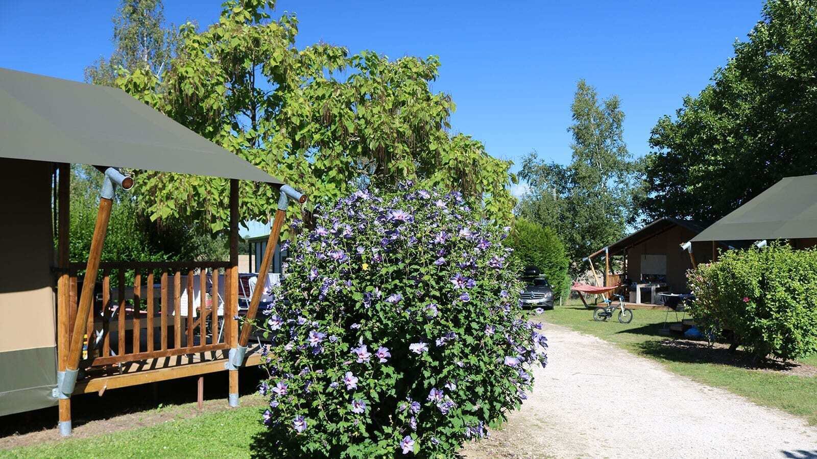 Luxury glamping tent in a family campground