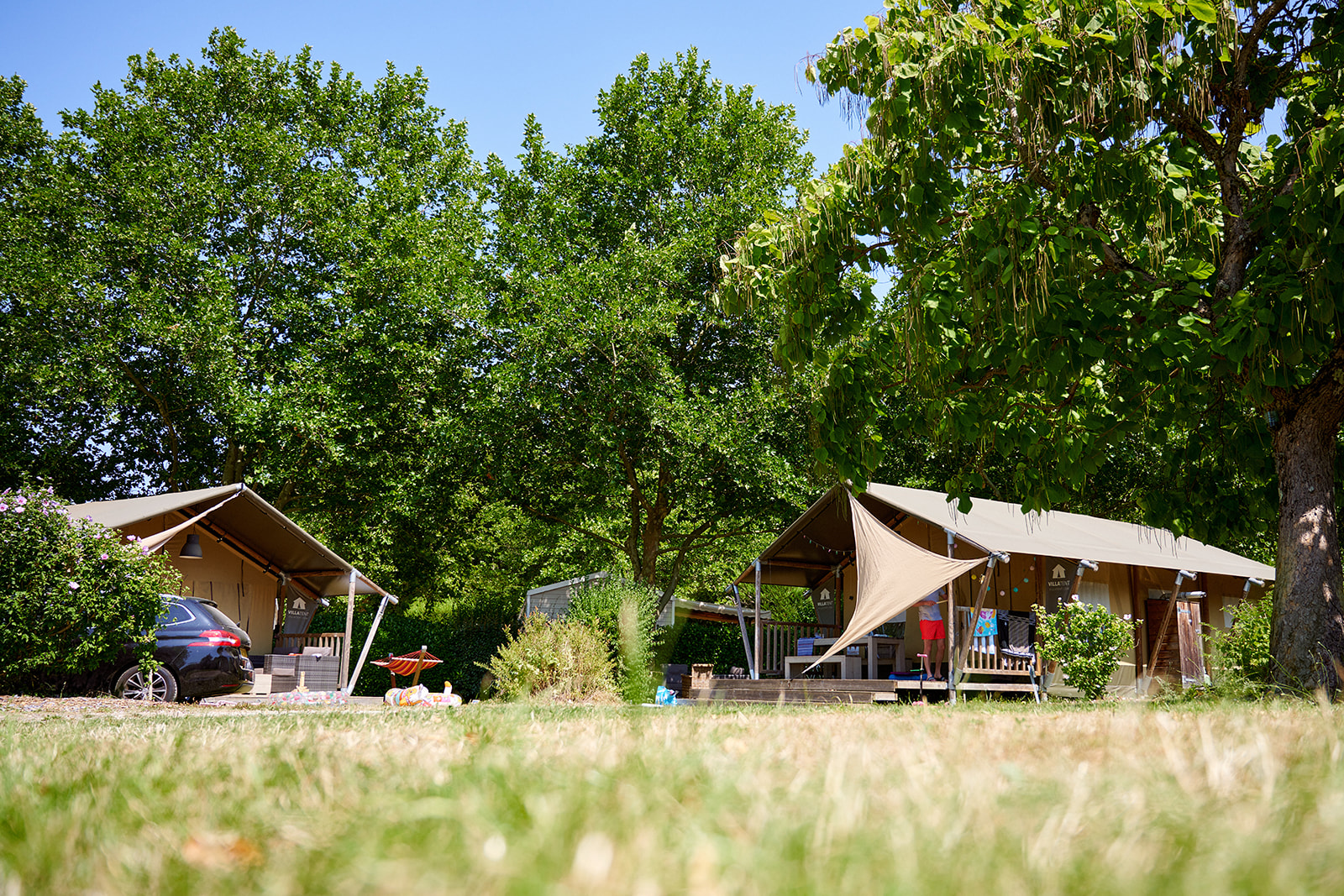Luxury glamping tent in a family campground